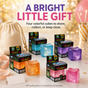 Four individually boxed glitter squeeze cubes arranged as a colorful gift idea