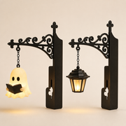 Ghost bookshelf lantern and vintage lantern variants with ornate black bookend brackets
